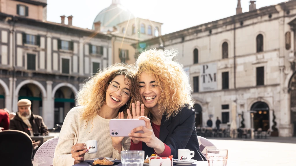 Girls having Segafredo coffee.jpg